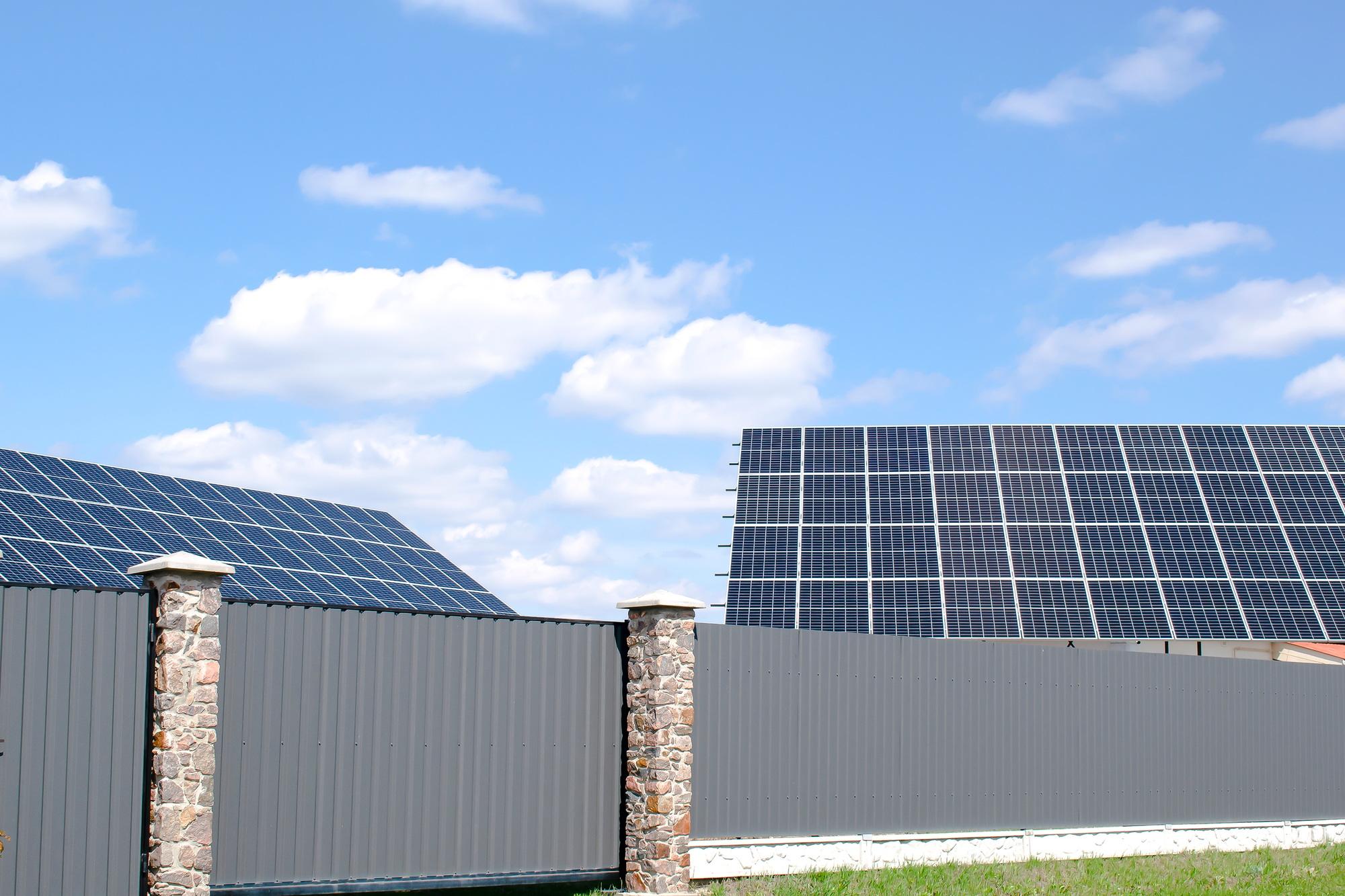 new-modern-residential-house-cottage-with-solar-photo-voltaic-panel-system-on-roof-ecological-energy.jpg